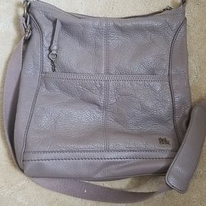 The Sak taupe colored crossbody
